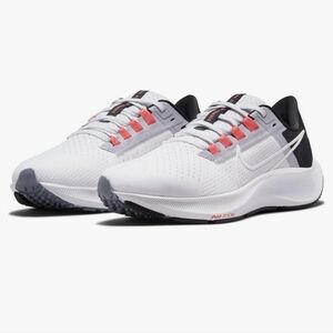 Nike air zoom pegasus 38 size 7 pink, white, and black.